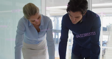 Business Colleagues Analyzing Digital Financial Data