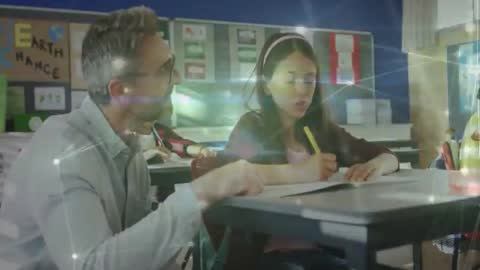 Teacher Guiding Student with Animated Visual Aids in Classroom