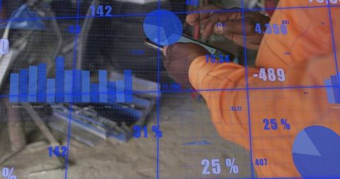 Technician holding smartphone in workshop with blue analytics overlay and dashboard