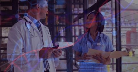 Medical staff reviewing records with dna overlay highlighting genetics collaboration and teamwork