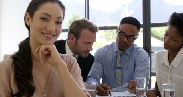 Diverse Team Collaborating in an Office Meeting - Download Free Stock Images Pikwizard.com