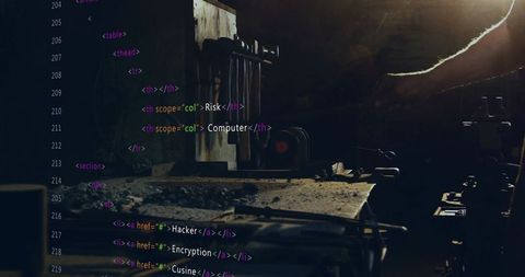 Industrial Workshop Projecting Colorized HTML Code Across Metal Bench with Tools