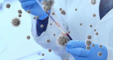 Doctors Analyzing Covid-19 Samples with Virus Cells Around