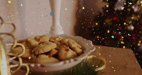 Jam Thumbprint Cookies on Scalloped Plate with Festive Holiday Bokeh and Gold Accents