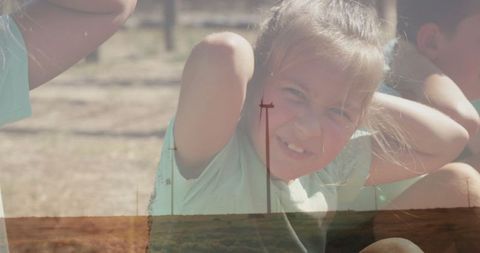 Girl and brothers exercising outdoors at sunset for active lifestyle