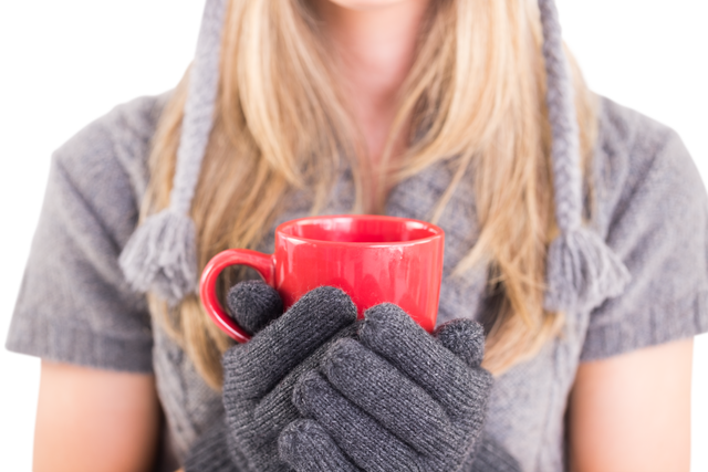 Woman Holding Red Mug Wearing Winter Clothes on Transparent Background - Download Free Stock Videos Pikwizard.com