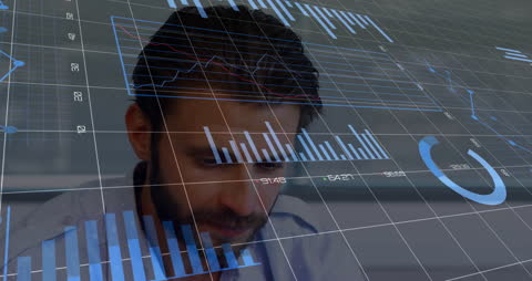 Caucasian Businessman Analyzing Data with Digital Financial Graphics
