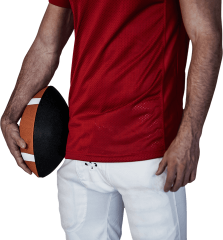 Rugby player holding ball in red jersey isolated on transparent background