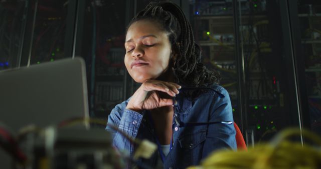 Female IT Professional Taking a Break in Server Room - Download Free Stock Images Pikwizard.com