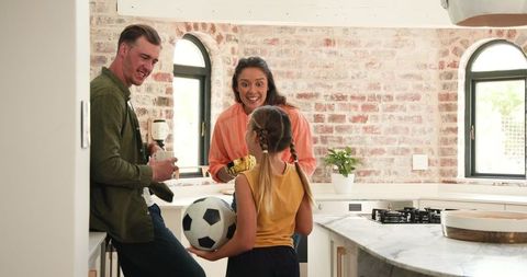Family Celebrating Child's Sports Achievement