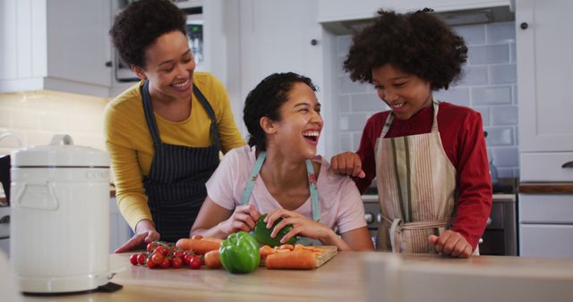 Family Enjoying Quality Time While Preparing Meal in Modern Kitchen - Download Free Stock Images Pikwizard.com