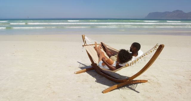 Couple Relaxing in Hammock on Tropical Beach - Download Free Stock Images Pikwizard.com