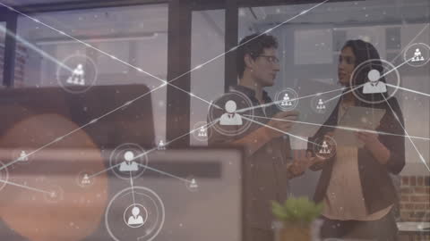 Diverse Colleagues Discussing in Modern Office Digital Network Overlay