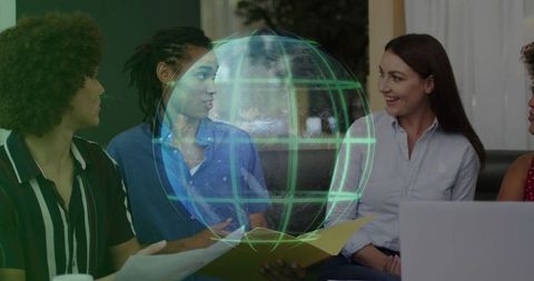 Corporate Team Collaborating with Holographic Globe Technology