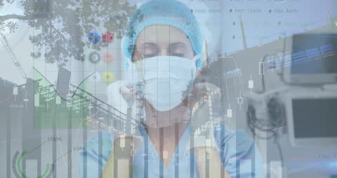 Surgeon Examining Data Overlay in High-Tech Operating Room