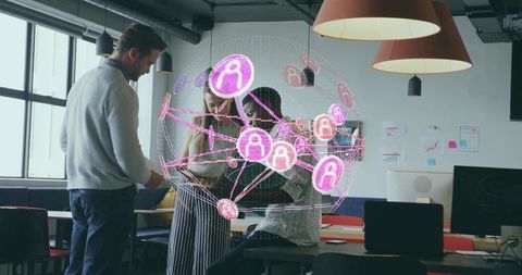 Team Collaborating on Holographic Network in Modern Office