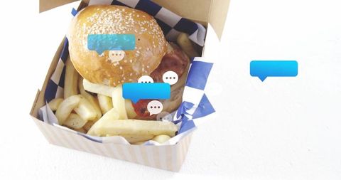 Takeout burger and fries with digitized chat overlay