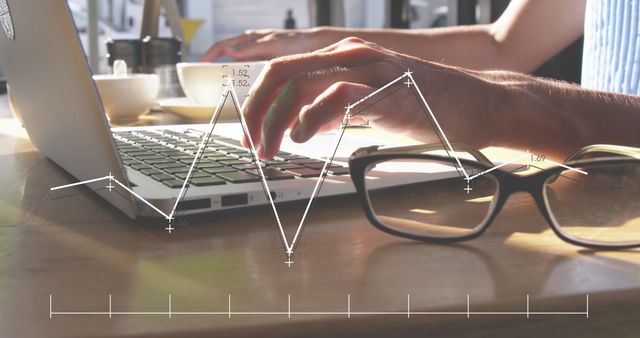 Hands Typing on Laptop with Data Analytics Graph - Download Free Stock Images Pikwizard.com