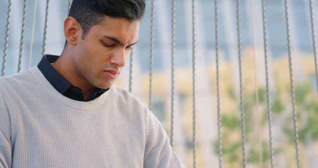 Thoughtful Young Man Concentrating Outdoors - Download Free Stock Images Pikwizard.com