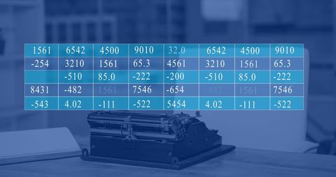 Vintage Typewriter and Modern Data in Office Setting