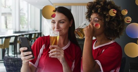 Diverse Friends Enjoying Beer and Social Media Together