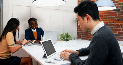 Diverse Collaboration in Modern Office Setting - Download Free Stock Images Pikwizard.com