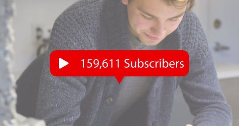 Young Man Engaging with Smartphone and Social Media