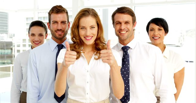 Group of Diverse Business Colleagues Giving Thumbs Up in Bright Office - Download Free Stock Images Pikwizard.com