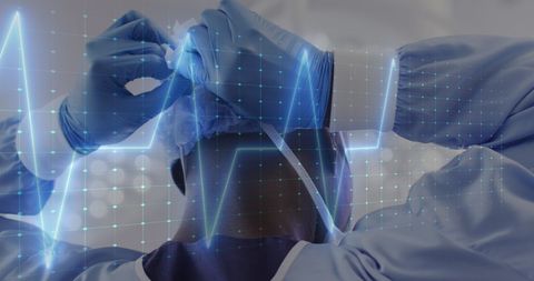 African American Surgeon Masking Up with Cardiology Overlay