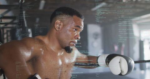 Boxer Practicing in Gym with Code Overlay, Combining Athleticism and Technology