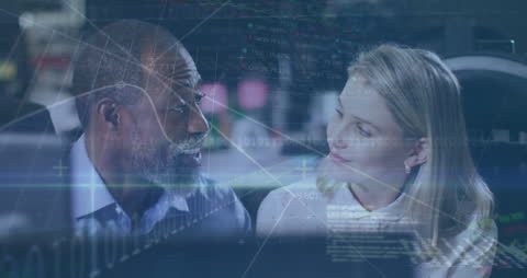 Animated Data over Business Professionals in Modern Office