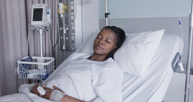 African American Woman Resting in Hospital Bed with Medical Equipment - Download Free Stock Images Pikwizard.com