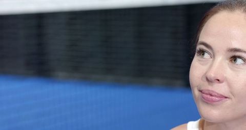 Inspired Woman in Athletic Wear on Tennis Court