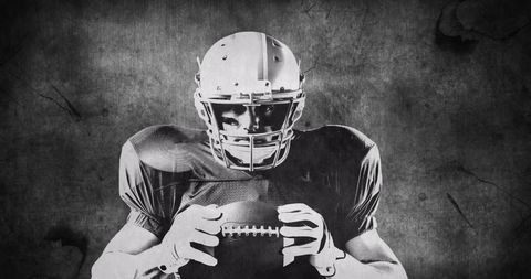 Silhouetted American Football Player Holding Ball Against Abstract Background - Download Free Stock Images Pikwizard.com