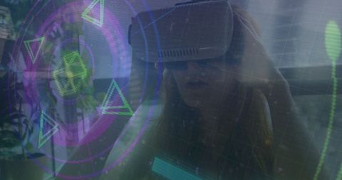 Woman Using VR Headset with Digital Interface Overlay