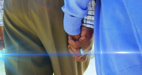 Senior Couple Holding Hands Symbolizing Love and Companionship