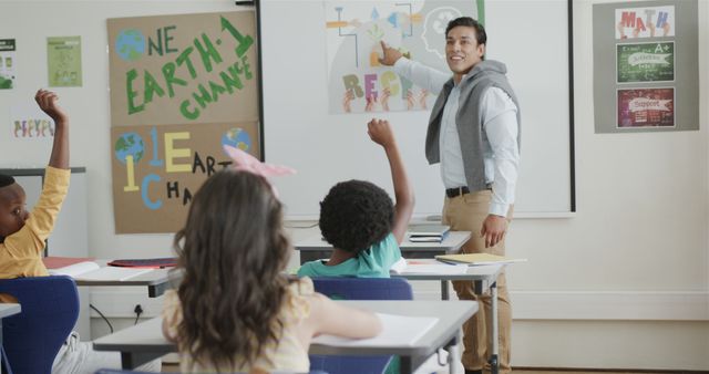 Male Teacher Educating Multiethnic Students on Environmental Issues - Download Free Stock Images Pikwizard.com