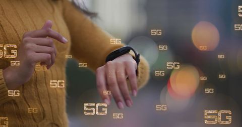 5G Technology Integrated Smartwatch Used by Woman in Urban Environment