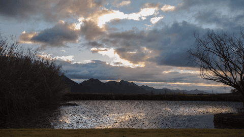 Transparent Clouds over Dusky Mountain Landscape at Sunset - Download Free Stock Videos Pikwizard.com