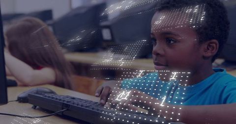 Young Boy Coding in Computer Lab with Digital Overlay