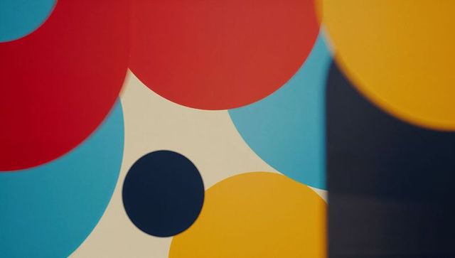 Colorful Geometric Shapes on Cream Background with Modern Design