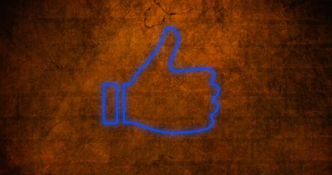 Neon Blue Thumbs Up Against Grungy Wall Background