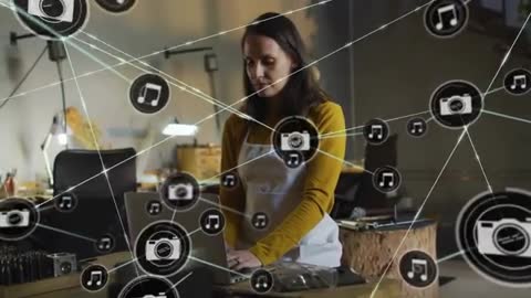 Craftsperson Engaged in Digital Networking with Creative Tech Icons