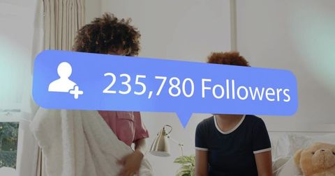 Chatting friends celebrating 235,780 followers in cozy bedroom with teddy, plants, lamp
