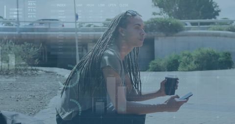Businessman Analyzing Financial Data with Smartphone and Coffee Outdoors