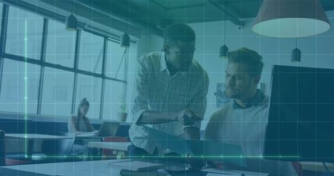 Coworkers Discussing Project Ideas in Modern Office Setting