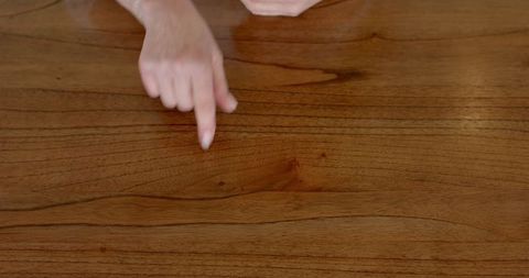 Hands Communicating Using Sign Language on Wooden Table - Download Free Stock Images Pikwizard.com