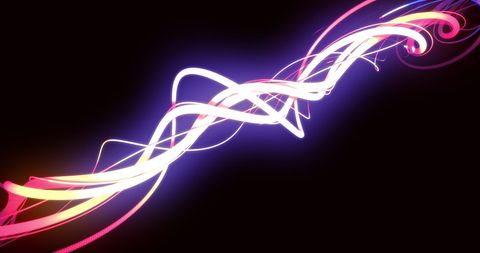 Abstract neon light trails on black background