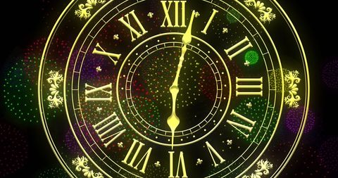 Midnight Clock with Fireworks Celebrating New Year's Eve - Download Free Stock Images Pikwizard.com