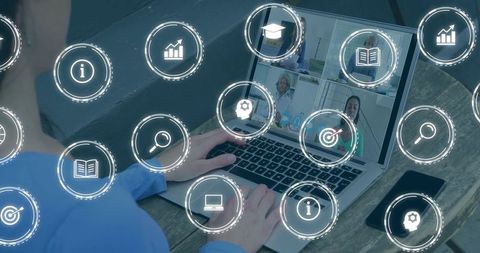 Remote team connecting via laptop video conference with digital collaboration icons